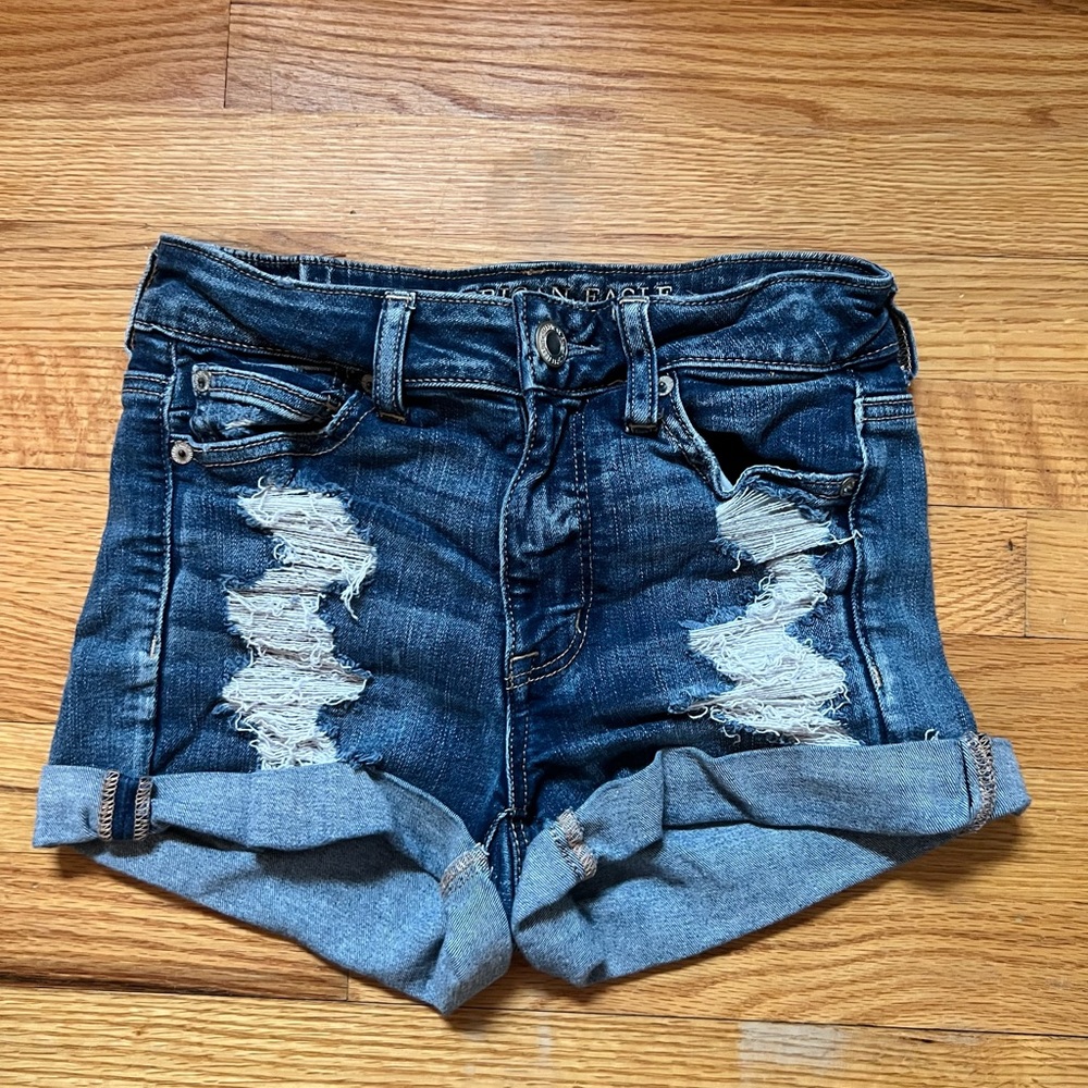 Item: Medium wash distressed high waisted jean shorts